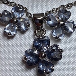 Cubic Zirconia necklace with matching earrings, silver tone.